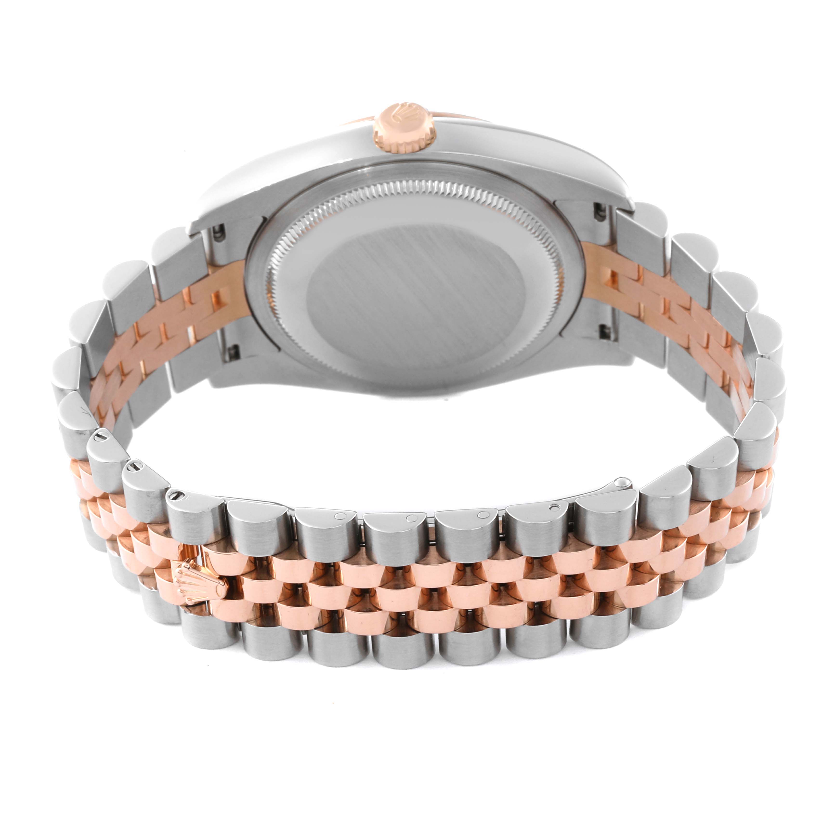 The image shows the back of a Rolex Datejust 116231 Men's Steel and Gold (two tone) Pink Dial 116231 Men's Steel and Gold (two tone) Pink Dial watch focusing on the case back and the two-tone bracelet.