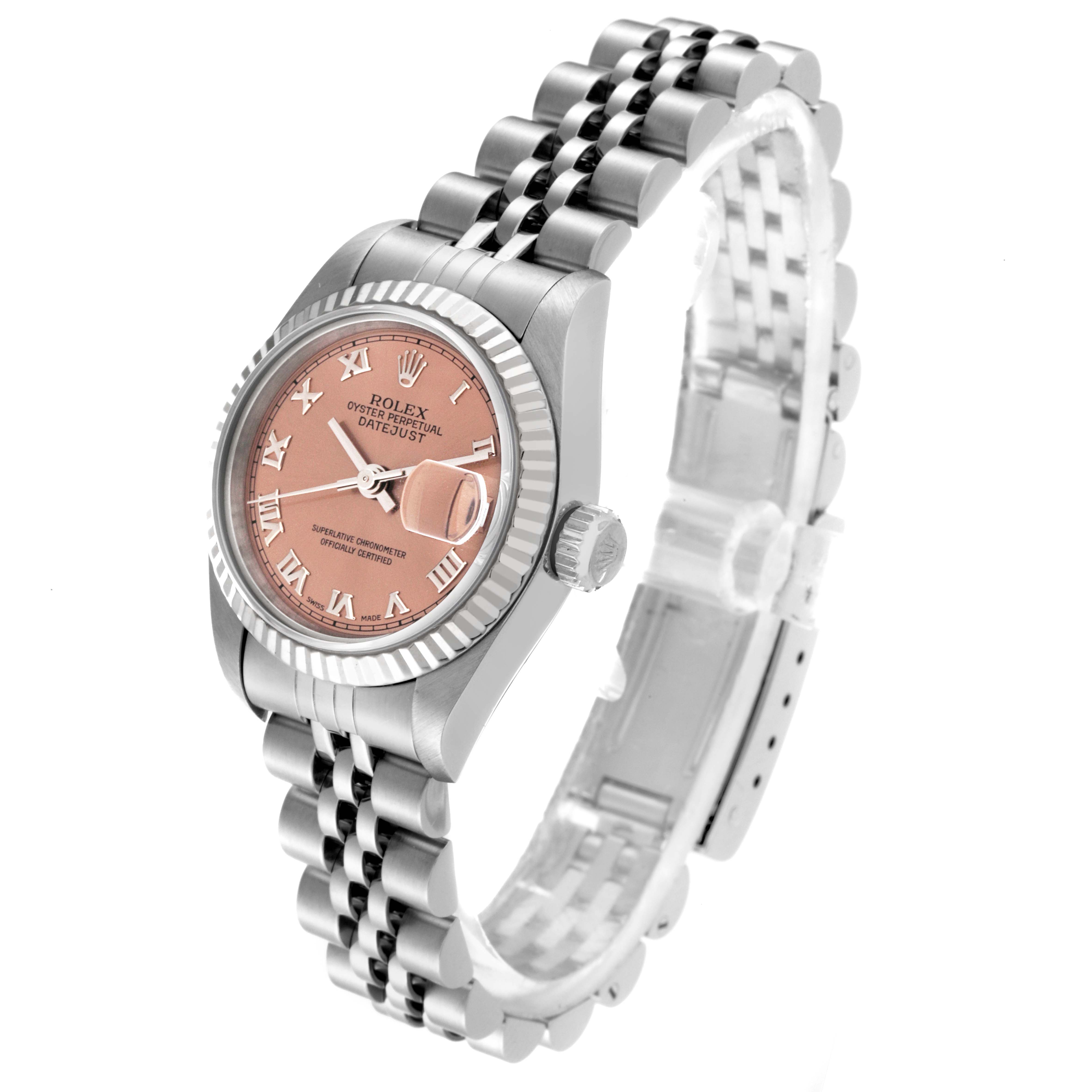 The Rolex Datejust 69174 Women's Stainless Steel Pink Dial 69174 Women's Stainless Steel Pink Dial watch is shown at an angle, highlighting the face, bezel, crown, and bracelet.