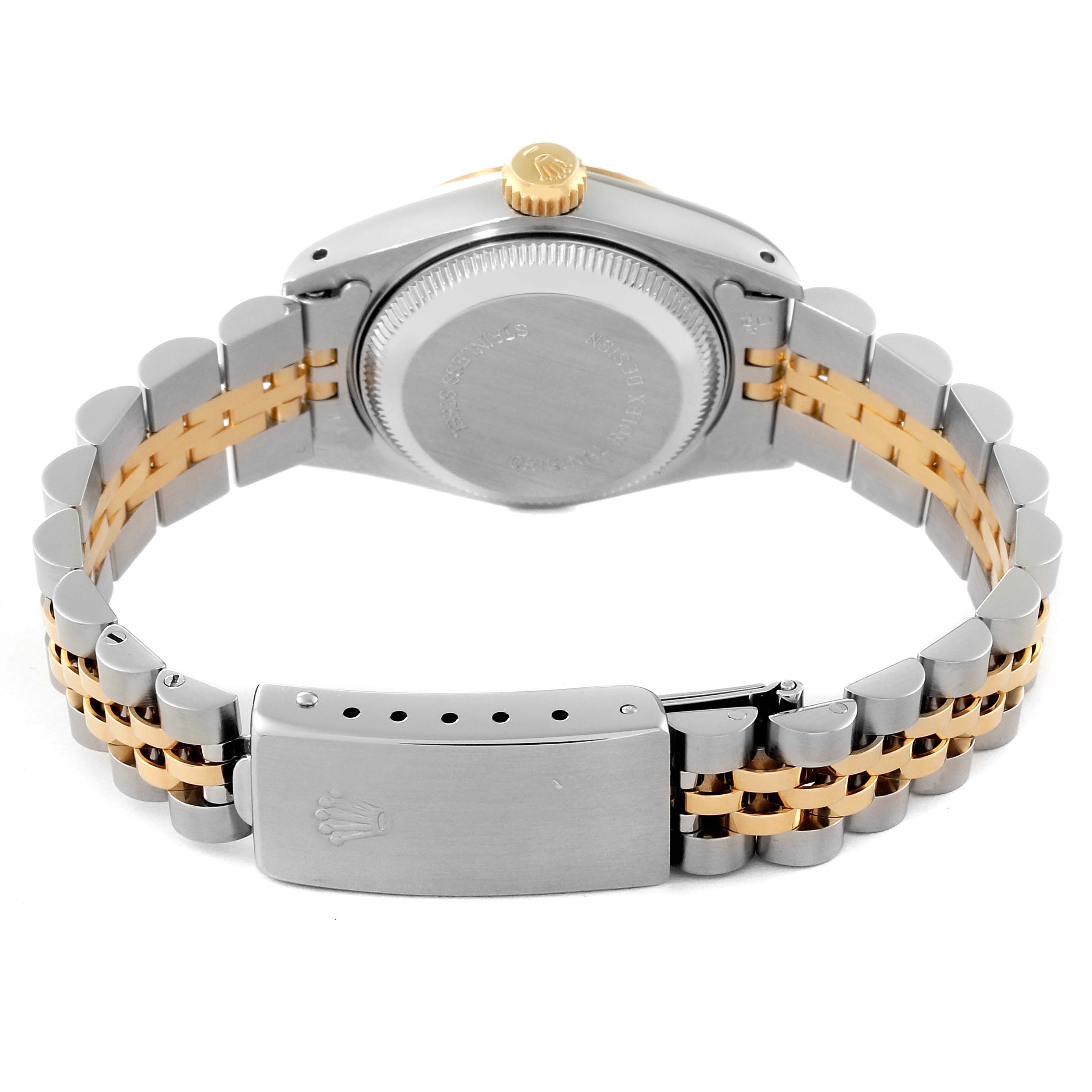 This image shows the back case and bracelet of a Rolex Datejust 69173 Women's Steel and Gold (two tone) Champagne Dial 69173 Women's Steel and Gold (two tone) Champagne Dial watch, highlighting the two-tone metal link design and clasp.
