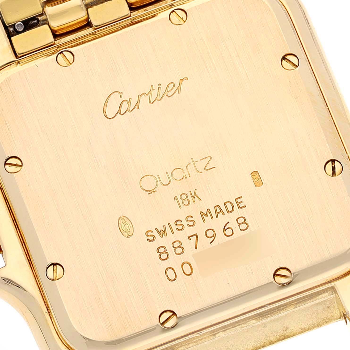 This image shows the back case of a Cartier Panthere W2501489 Men's Yellow Gold Silver Dial W2501489 Men's Yellow Gold Silver Dial watch, highlighting its engravings and screws.