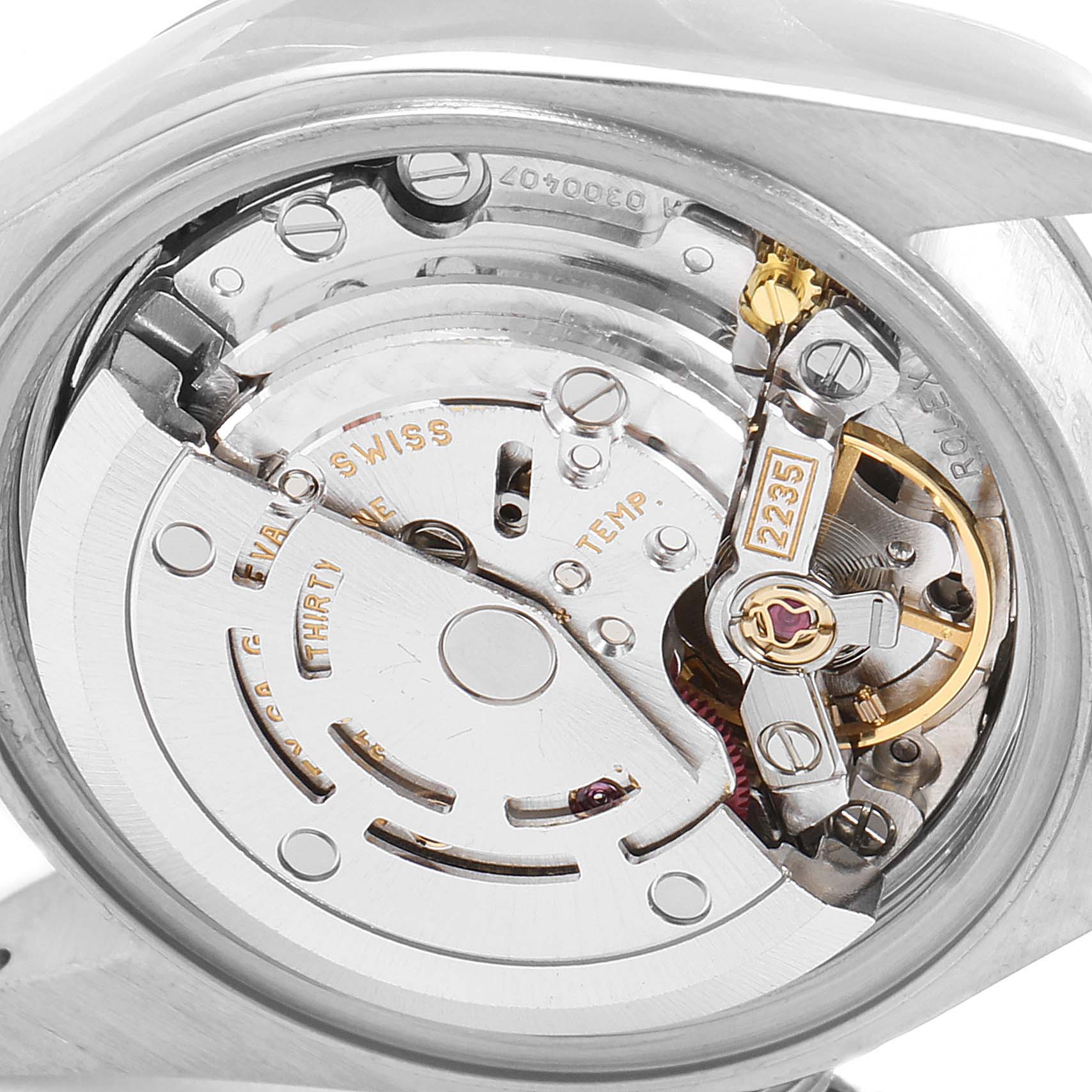The image shows the movement and internal mechanism of a Rolex Date 79190 Women's Stainless Steel White Dial 79190 Women's Stainless Steel White Dial model watch from a close-up angle.