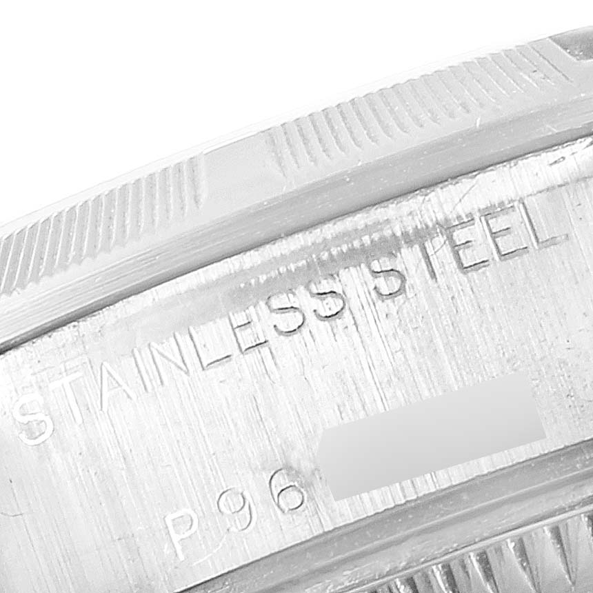 The image shows a close-up of the stainless steel case back and bezel of the Rolex Date 79190 Women's Stainless Steel White Dial 79190 Women's Stainless Steel White Dial model watch.