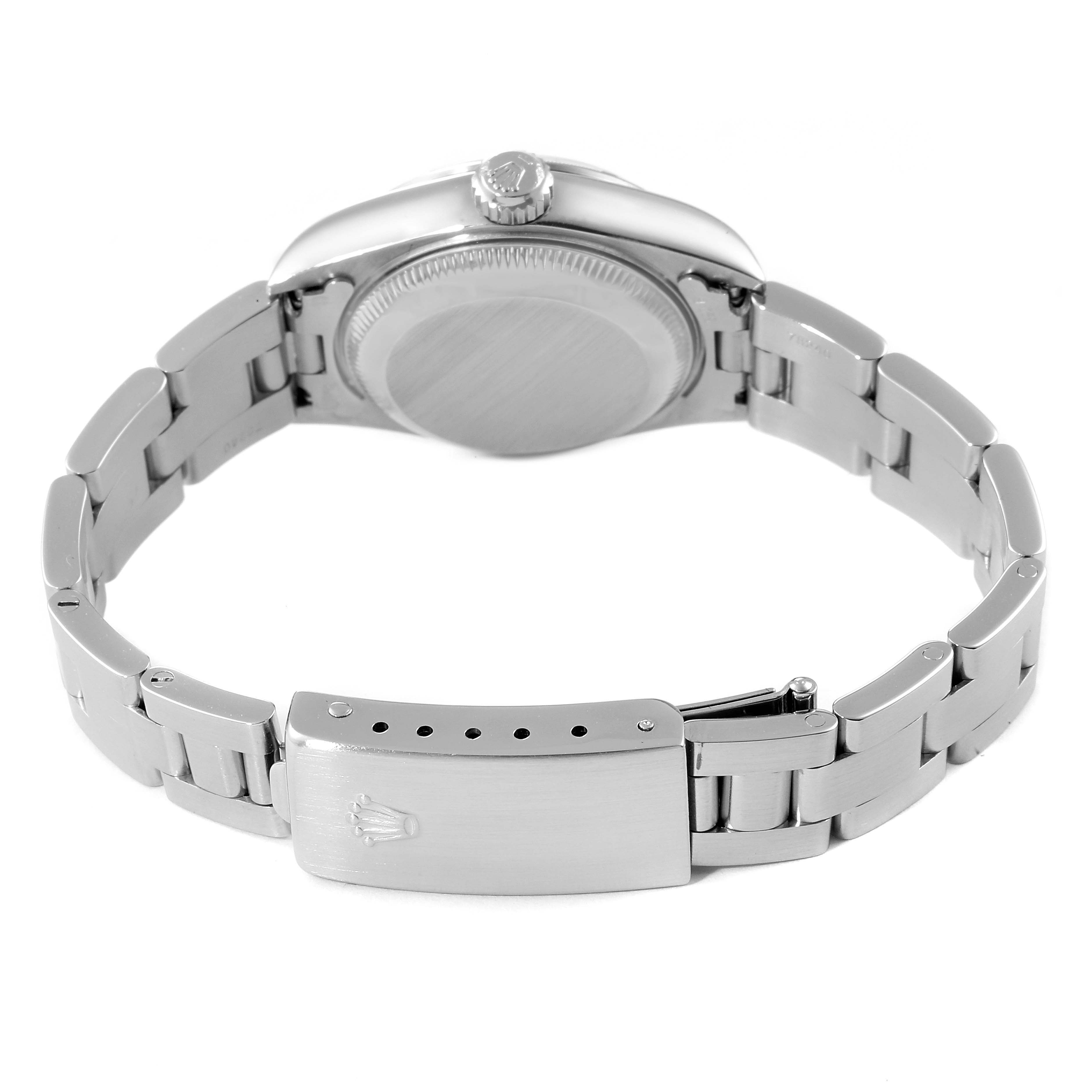 The image shows the back view of a Rolex Date 79190 Women's Stainless Steel White Dial 79190 Women's Stainless Steel White Dial model watch, featuring the case back and bracelet with the clasp open.