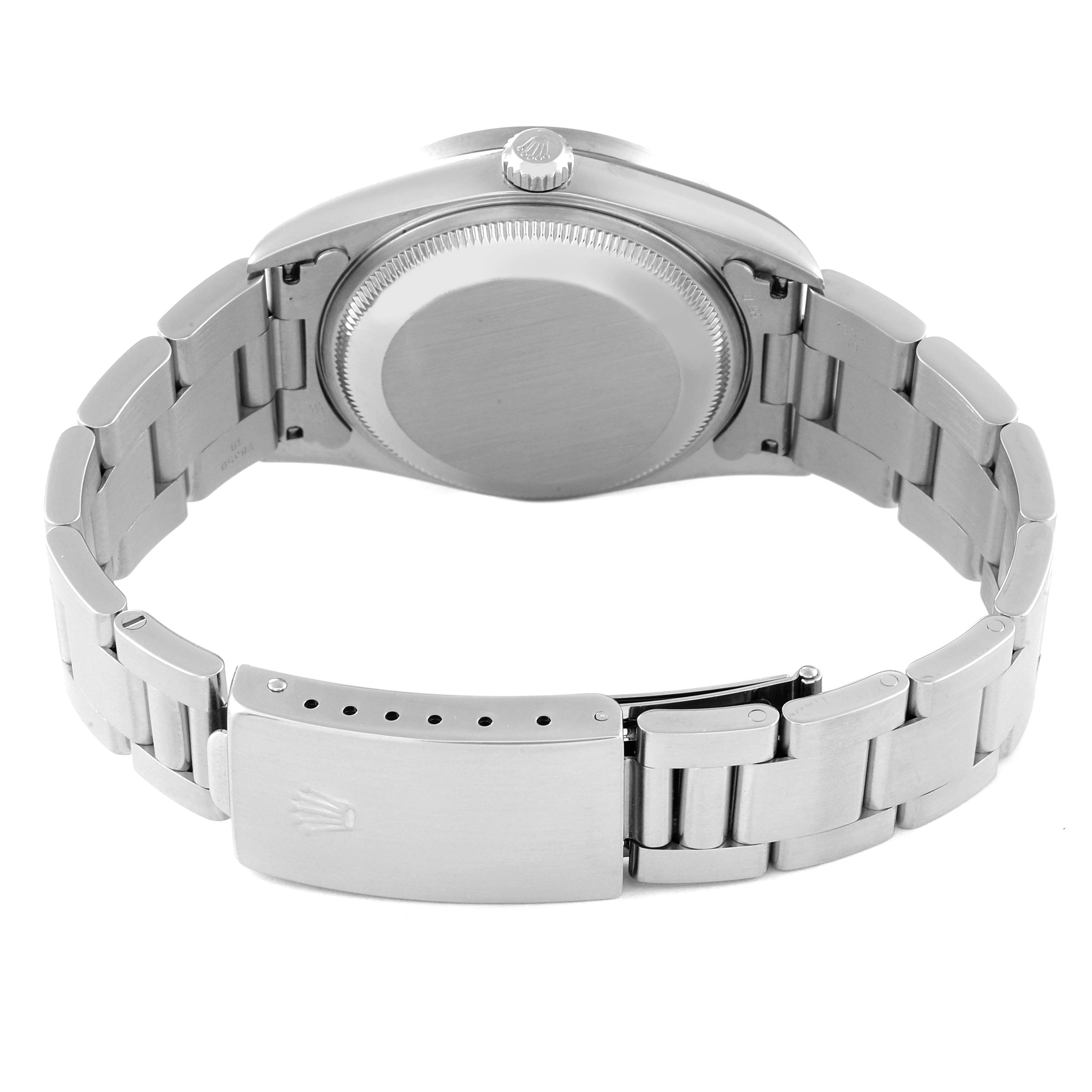 The image shows the back view of a Rolex Date 15210 Men's Stainless Steel Black Dial 15210 Men's Stainless Steel Black Dial model watch, highlighting the case back and bracelet clasp.