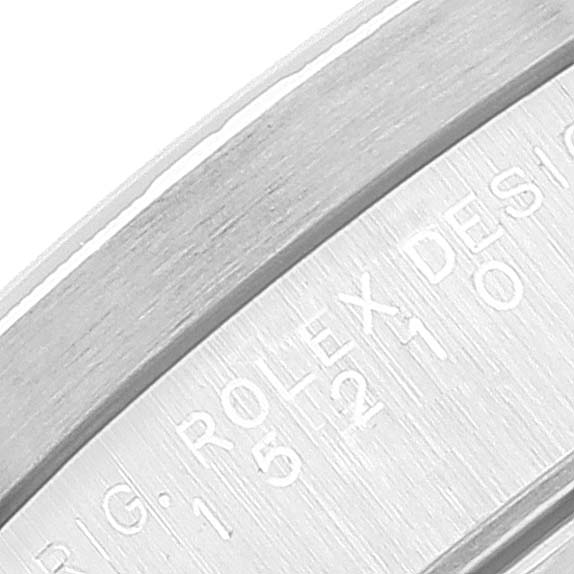 This close-up shows the engraved inner bezel (rehaut) of a Rolex Date 15210 Men's Stainless Steel Black Dial 15210 Men's Stainless Steel Black Dial model watch.
