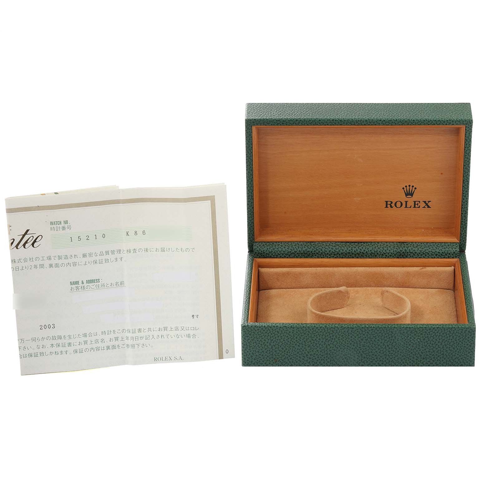The image shows the open box and manual for a Rolex Date 15210 Men's Stainless Steel Black Dial 15210 Men's Stainless Steel Black Dial model watch.