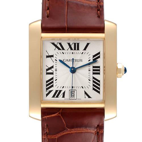 This image shows a close-up of the Cartier Tank Francaise W5000156 Men's Yellow Gold Silver Dial W5000156 Men's Yellow Gold Silver Dial watch, highlighting its dial, hands, crown, and leather strap.