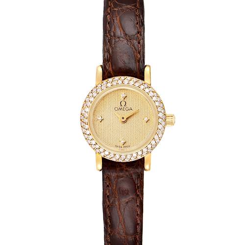 The Omega 1450 Women's Yellow Gold Champagne Dial 1450 Women's Yellow Gold Champagne Dial DeVille Mini Yellow Gold Diamond Cocktail Ladies Watch 1450 is shown from a top-down angle, displaying the face, bezel, and strap.