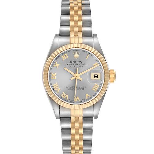 The Rolex Datejust model 69173 is shown from a top-down angle, highlighting the face, two-tone bracelet, fluted bezel, and date window.