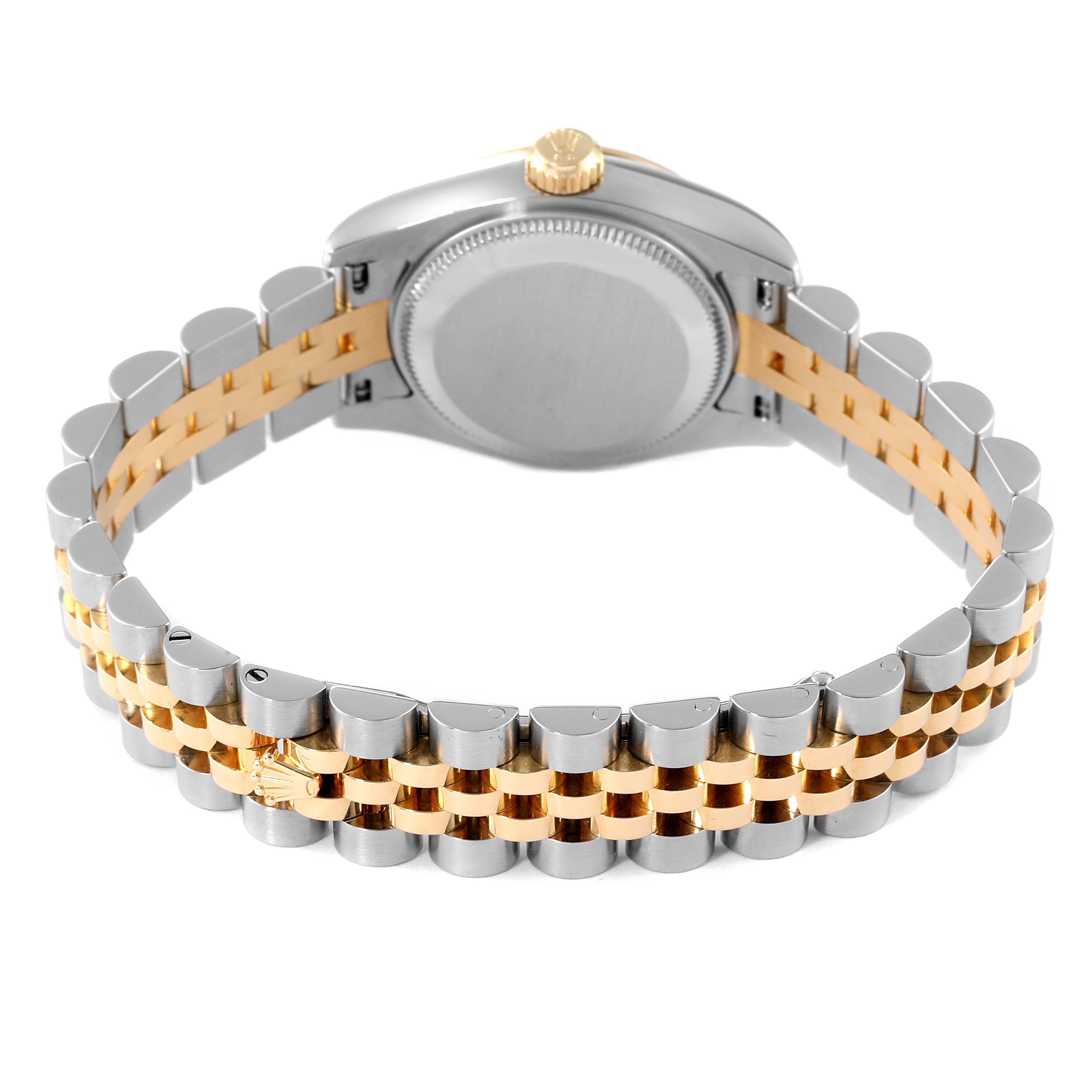 The image shows the back angle of a Rolex Datejust 179173 Women's Steel and Gold (two tone) Champagne Dial 179173 Women's Steel and Gold (two tone) Champagne Dial watch, highlighting the case back and two-tone bracelet.