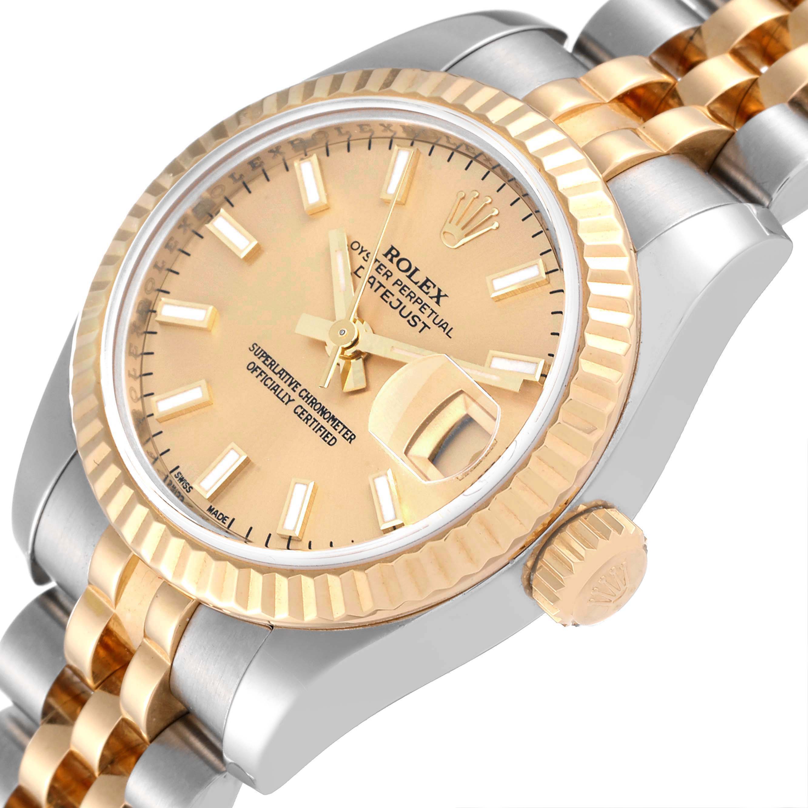 This close-up angle shows the dial, bezel, crown, and part of the bracelet of the Rolex Datejust 179173 Women's Steel and Gold (two tone) Champagne Dial 179173 Women's Steel and Gold (two tone) Champagne Dial watch.