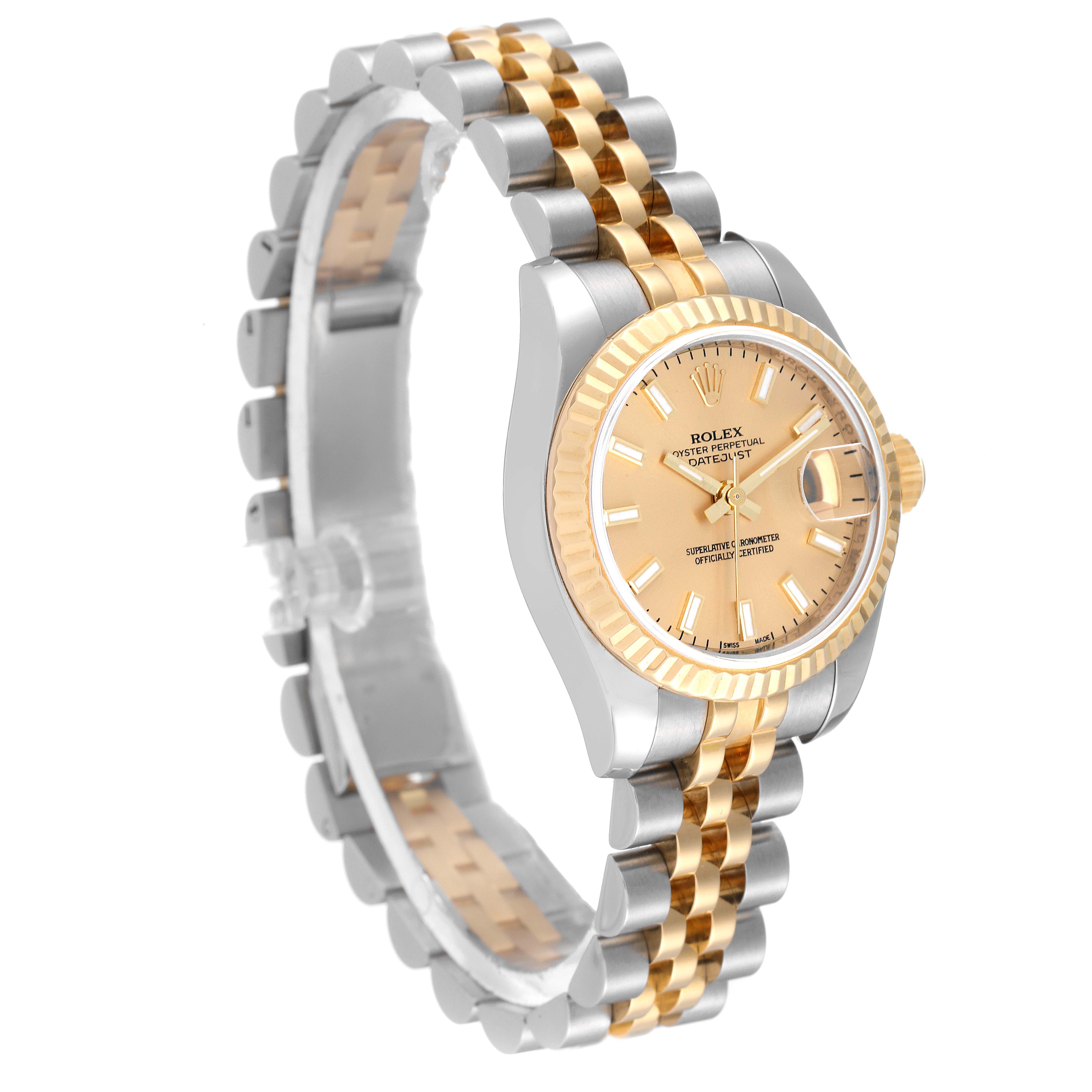 The Rolex Datejust 179173 Women's Steel and Gold (two tone) Champagne Dial 179173 Women's Steel and Gold (two tone) Champagne Dial watch is shown at a slight angle, displaying the face, bezel, crown, and part of the bracelet.