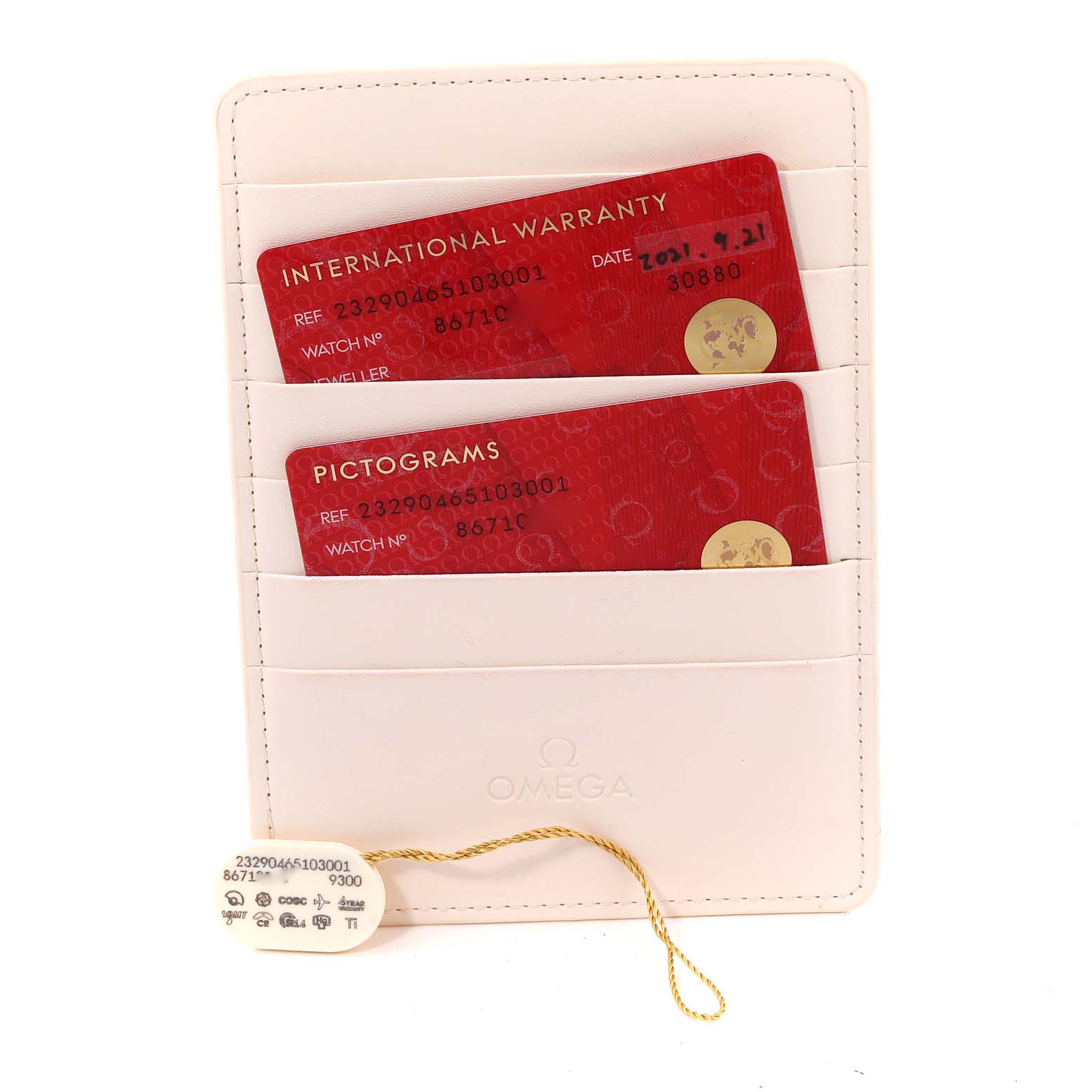 The image shows warranty cards and a tag for the Omega Planet Ocean 232.90.46.51.03.001 Men's Titanium Blue Dial 232.90.46.51.03.001 Men's Titanium Blue Dial model, displayed in a white cardholder.