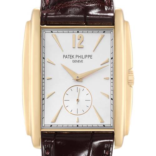 The image shows a front view of the Patek Philippe Gondolo 5124J Men's Yellow Gold Silver Dial 5124J Men's Yellow Gold Silver Dial watch, highlighting its rectangular dial, gold hands, and leather strap.