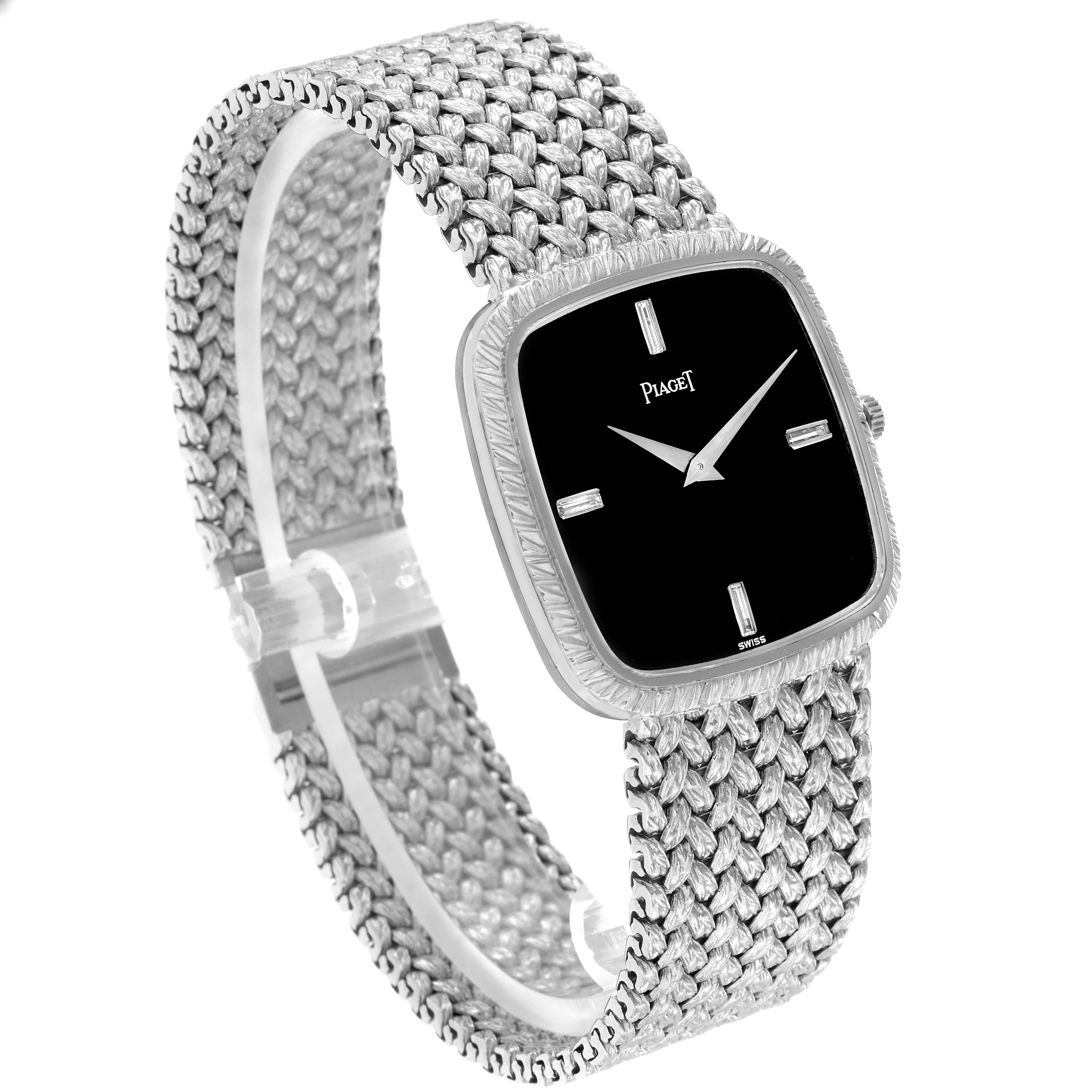 The Piaget model 9771D2 men's watch is shown from a slightly angled side view, displaying the entire face and textured metal bracelet.