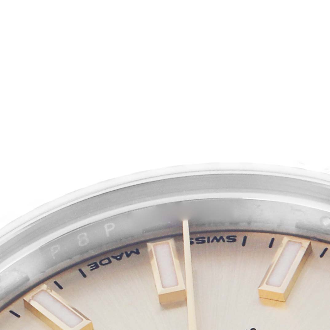 The image shows a close-up angle of the dial of the Rolex Datejust model 279173, highlighting the hour markers and minute hand.