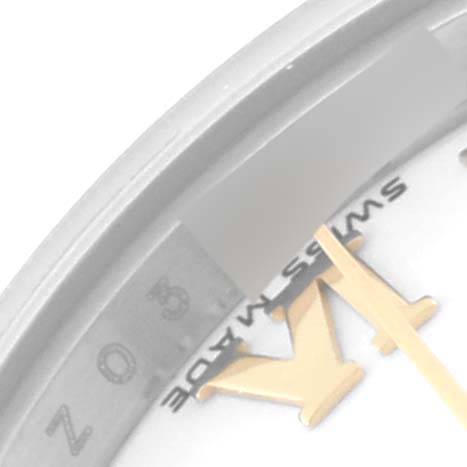 This is a close-up of the Rolex Datejust 179163 Women's Steel and Gold (two tone) White Dial 179163 Women's Steel and Gold (two tone) White Dial watch, showing the "Swiss Made" marking and part of the bezel.