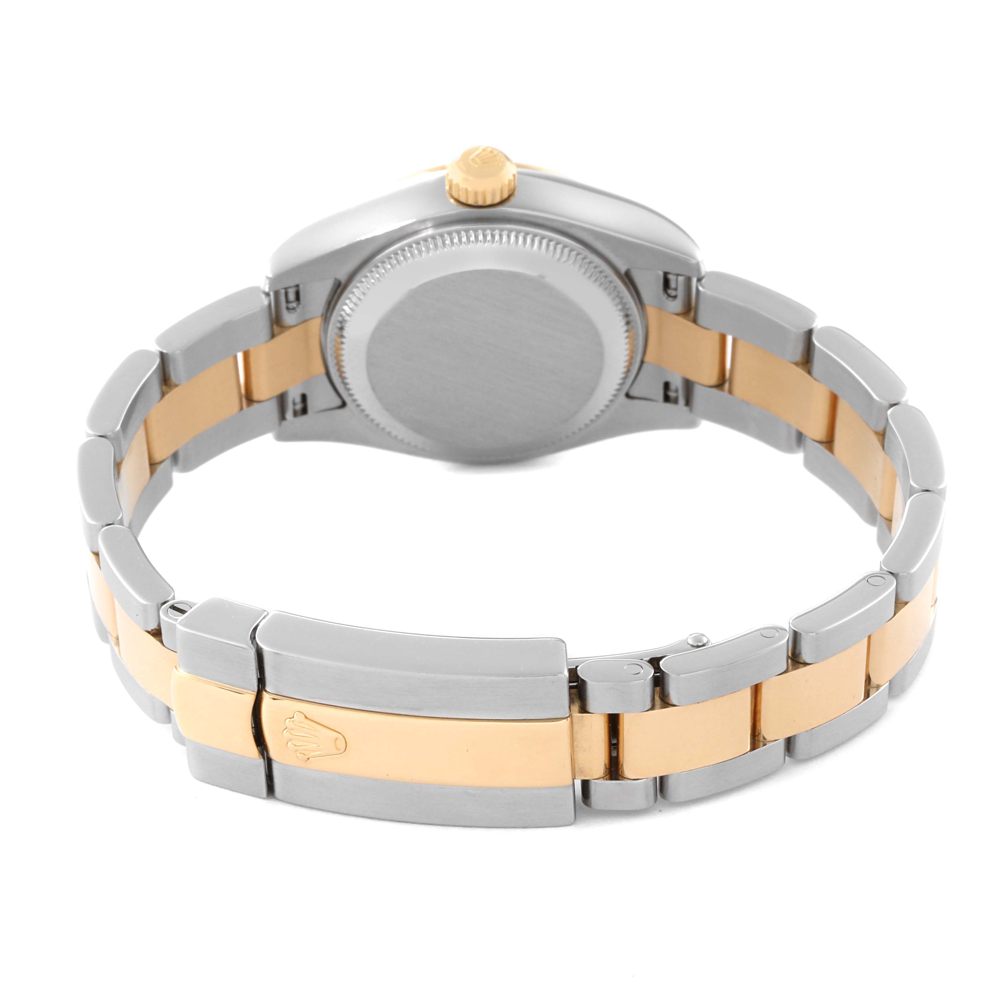 The image shows the backside and clasp of the Rolex Datejust 179163 Women's Steel and Gold (two tone) White Dial 179163 Women's Steel and Gold (two tone) White Dial watch, highlighting its two-tone bracelet and case back.