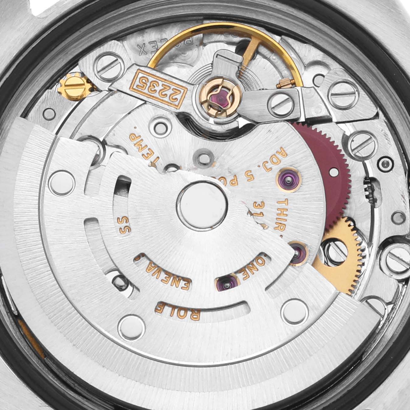This image shows a close-up of the inner mechanical movement of a Rolex Datejust 179163 Women's Steel and Gold (two tone) White Dial 179163 Women's Steel and Gold (two tone) White Dial watch.