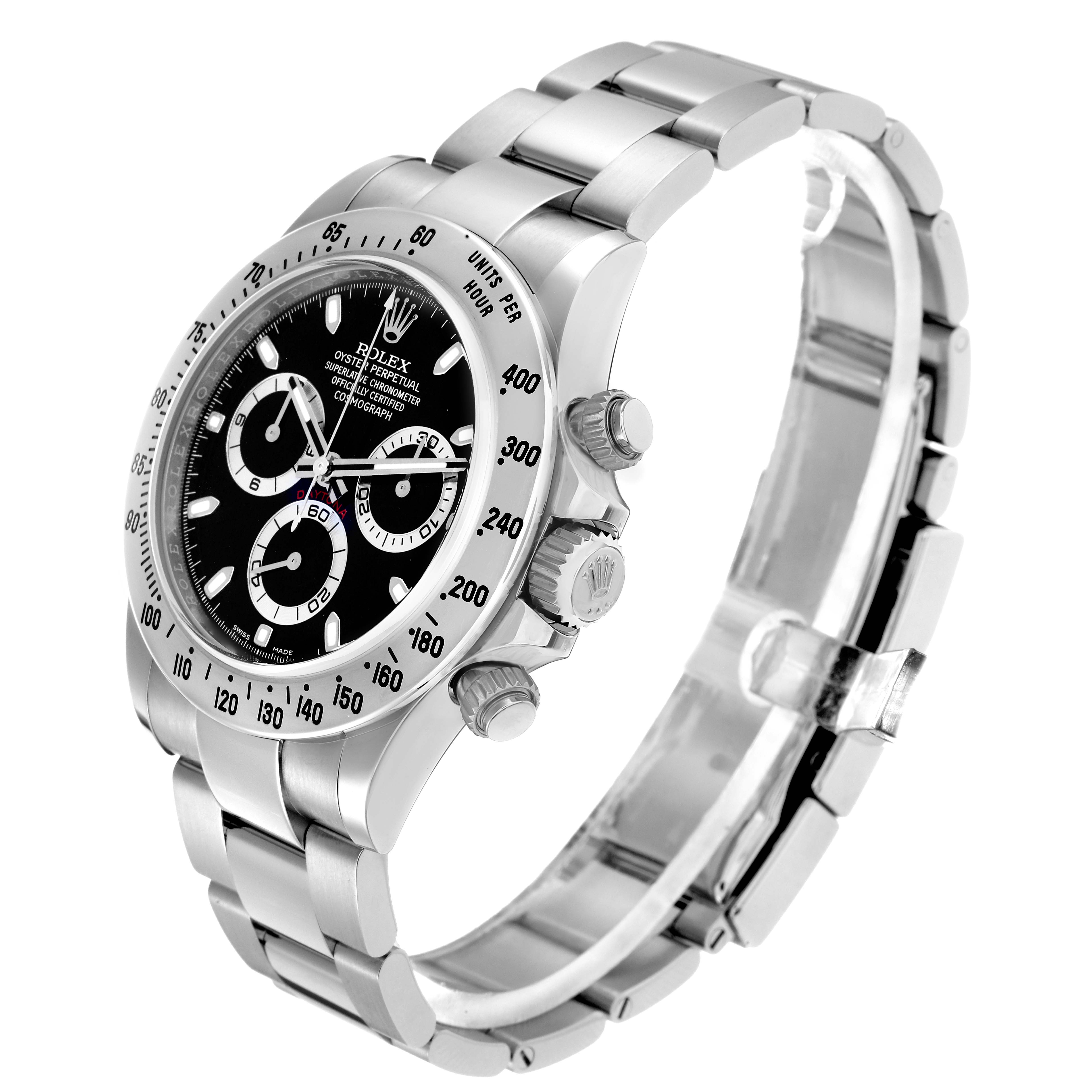The image shows a Rolex Daytona model 116520 men's watch at an angled view, highlighting the bezel, dial, chronograph subdials, crown, and stainless steel bracelet.