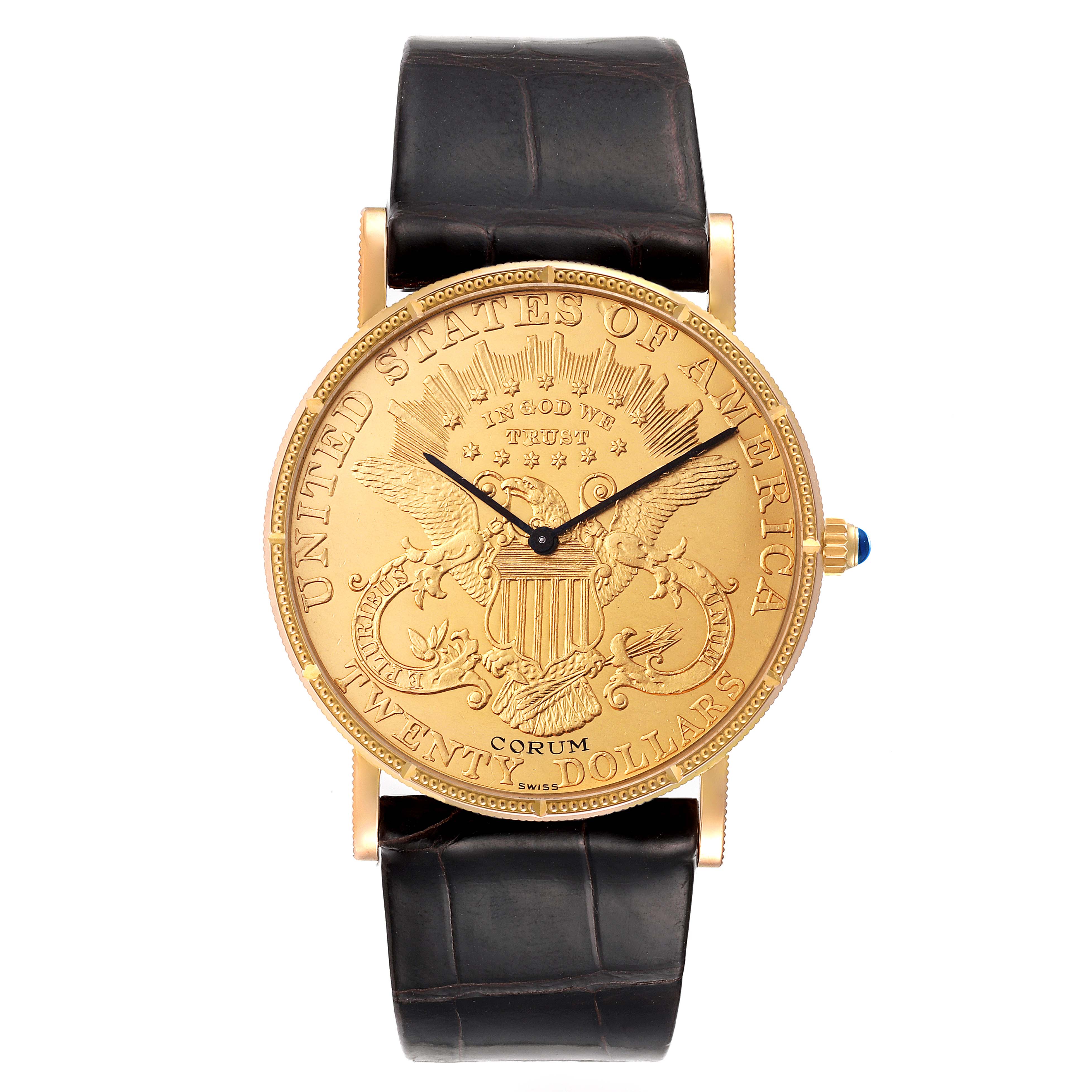 The image shows a Corum Coin Watch Men's Yellow Gold Black Dial Men's Yellow Gold Black Dial model from a front angle, featuring its gold dial and leather strap.