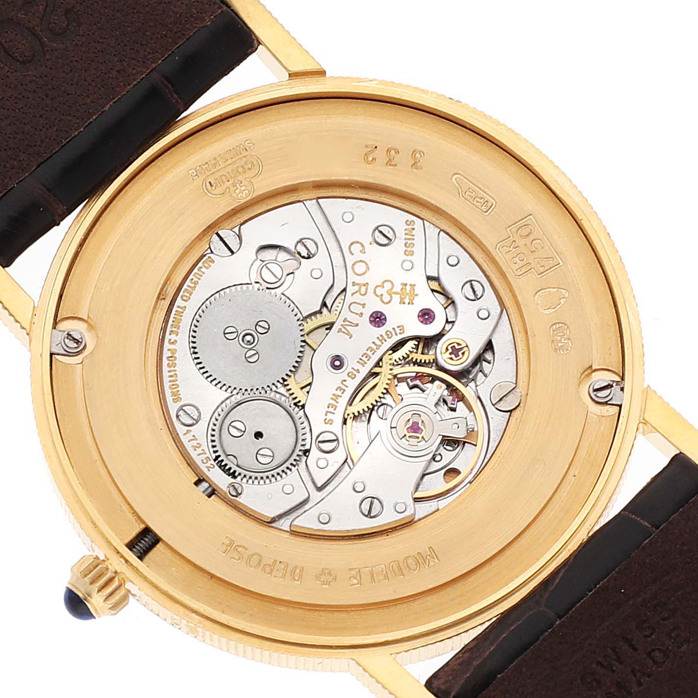 The image shows the back view of a Corum Coin Watch Men's Yellow Gold Black Dial Men's Yellow Gold Black Dial, highlighting its movement and internal mechanism.