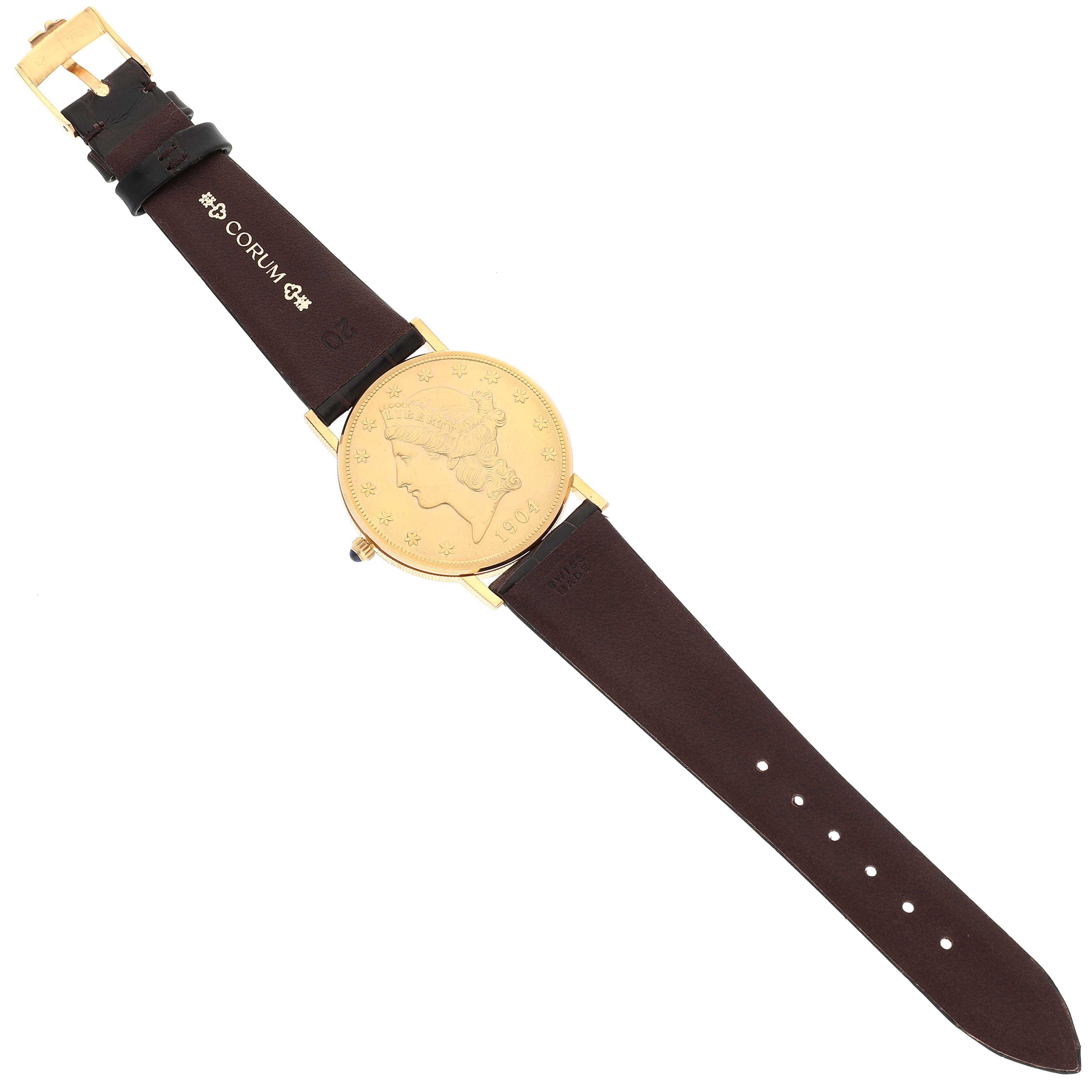 This image shows a top-down view of a Corum Coin Watch Men's Yellow Gold Black Dial Men's Yellow Gold Black Dial model with a gold coin dial and brown leather strap.