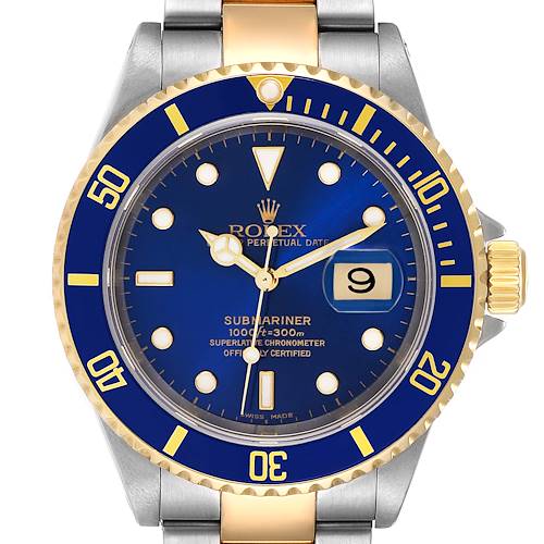 The image shows a front view of a Rolex Submariner 16613 Men's Steel and Gold (two tone) Blue Dial 16613 Men's Steel and Gold (two tone) Blue Dial watch, highlighting its blue dial, date window, and two-tone bracelet.