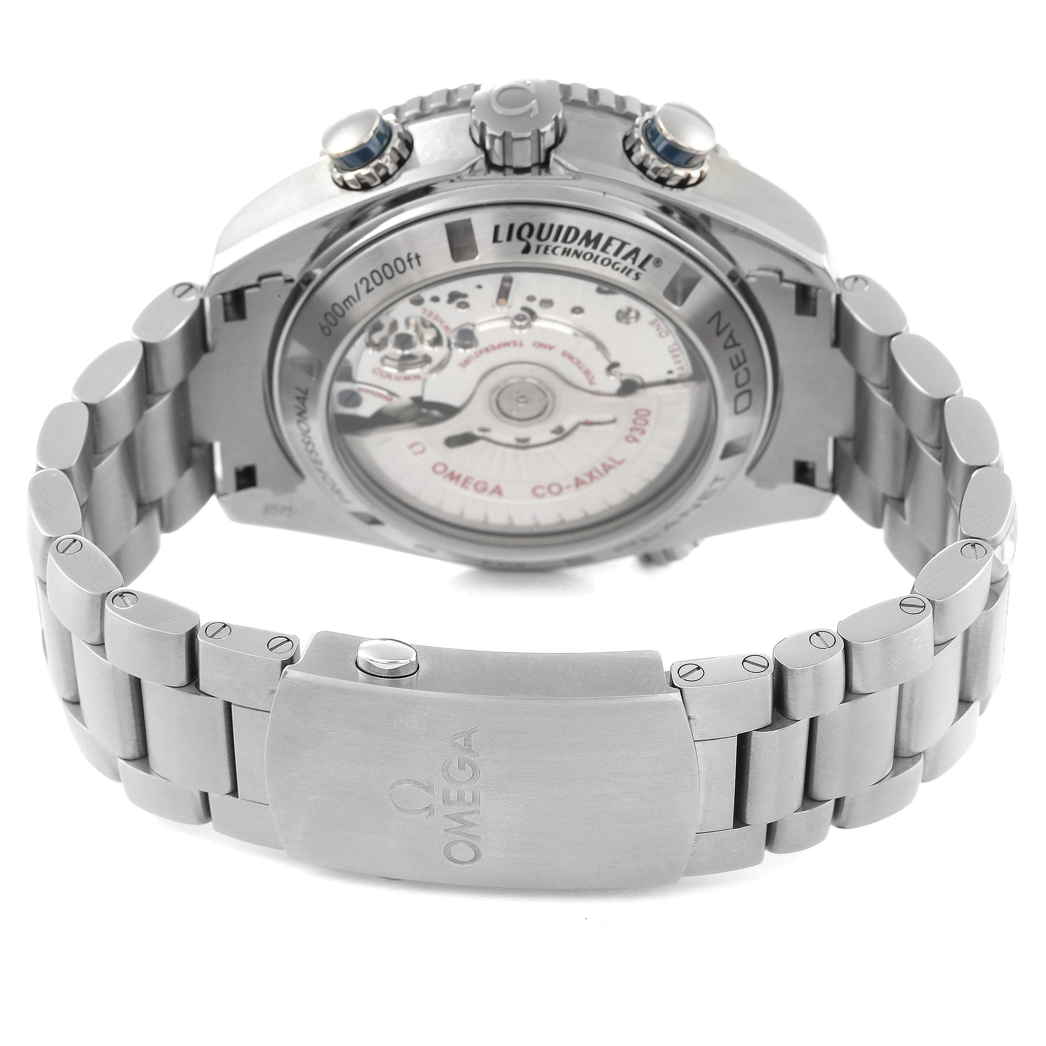 The image shows the back view of the Omega Planet Ocean 232.90.46.51.03.001 Men's Titanium Blue Dial 232.90.46.51.03.001 Men's Titanium Blue Dial watch, highlighting the movement and metal bracelet.