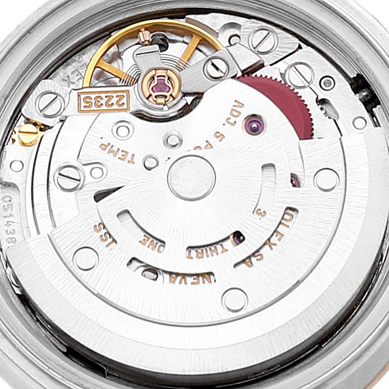 The image shows a close-up view of the Rolex Datejust 79173 Women's Steel and Gold (two tone) White Dial 79173 Women's Steel and Gold (two tone) White Dial watch movement from the back, highlighting its intricate components.