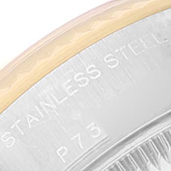 The image shows a close-up of the stainless steel case back edge of a Rolex Datejust 79173 Women's Steel and Gold (two tone) White Dial 79173 Women's Steel and Gold (two tone) White Dial watch.