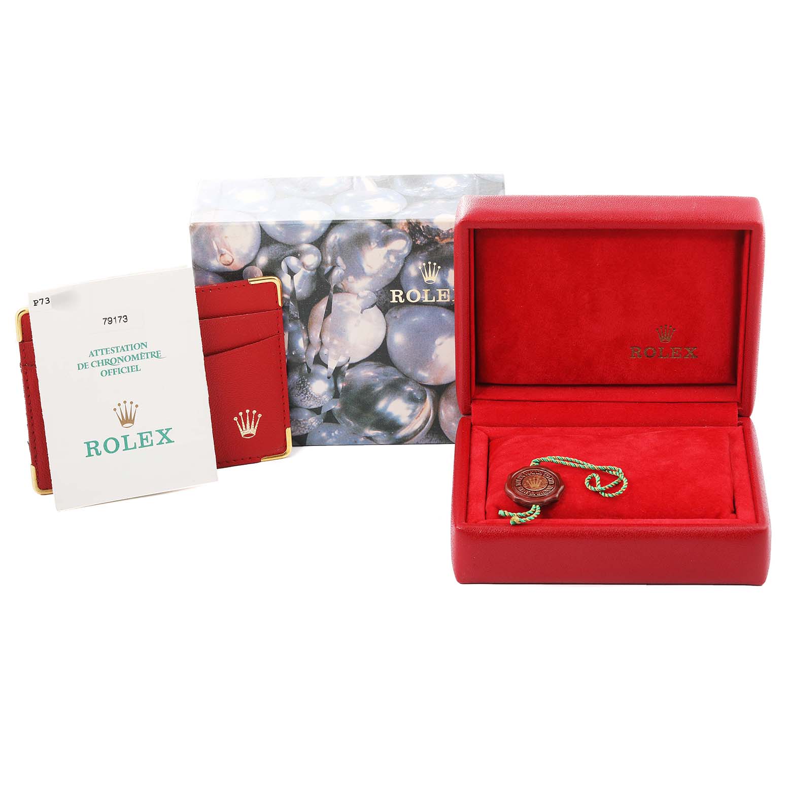 The image shows the packaging for a Rolex Datejust 79173 Women's Steel and Gold (two tone) White Dial 79173 Women's Steel and Gold (two tone) White Dial, including the box, booklet, certificate, and tag.