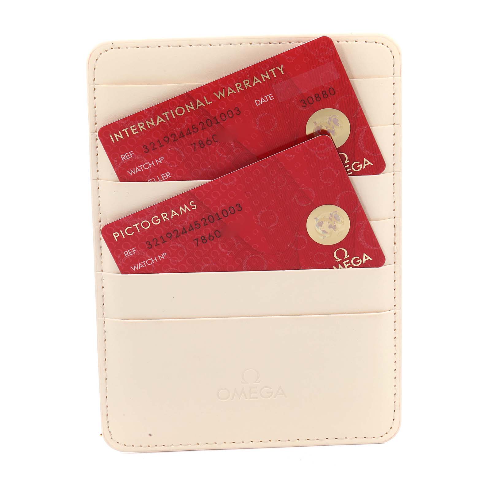 The image shows an Omega Speedmaster 321.92.44.52.01.003 Men's Titanium Black Dial 321.92.44.52.01.003 Men's Titanium Black Dial model's international warranty and pictograms cards in a cream-colored cardholder.