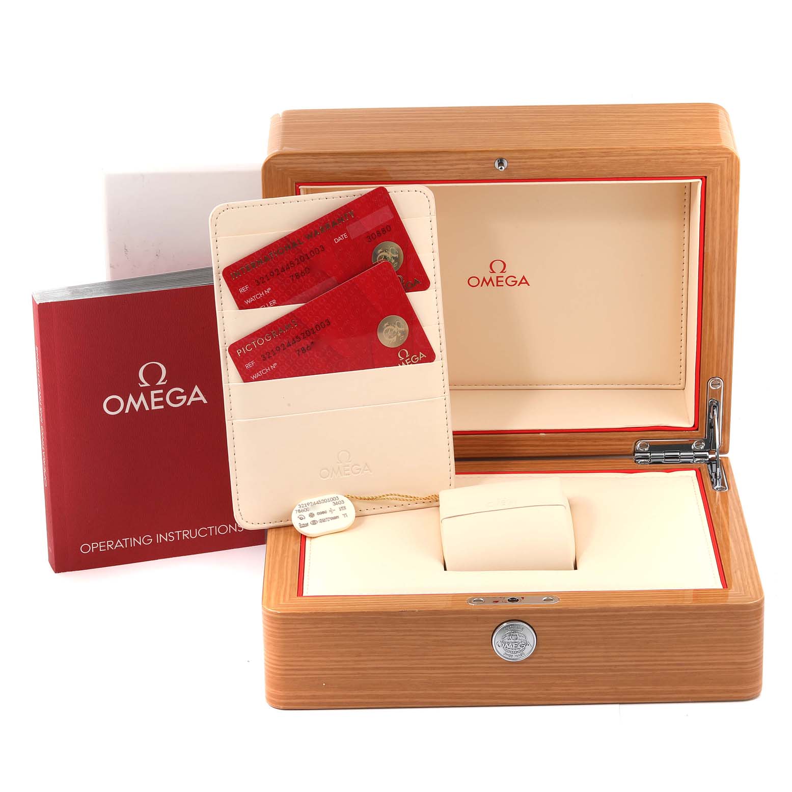 The image shows the Omega Speedmaster 321.92.44.52.01.003 Men's Titanium Black Dial 321.92.44.52.01.003 Men's Titanium Black Dial watch's box, operating instructions, warranty cards, and a leather cardholder.