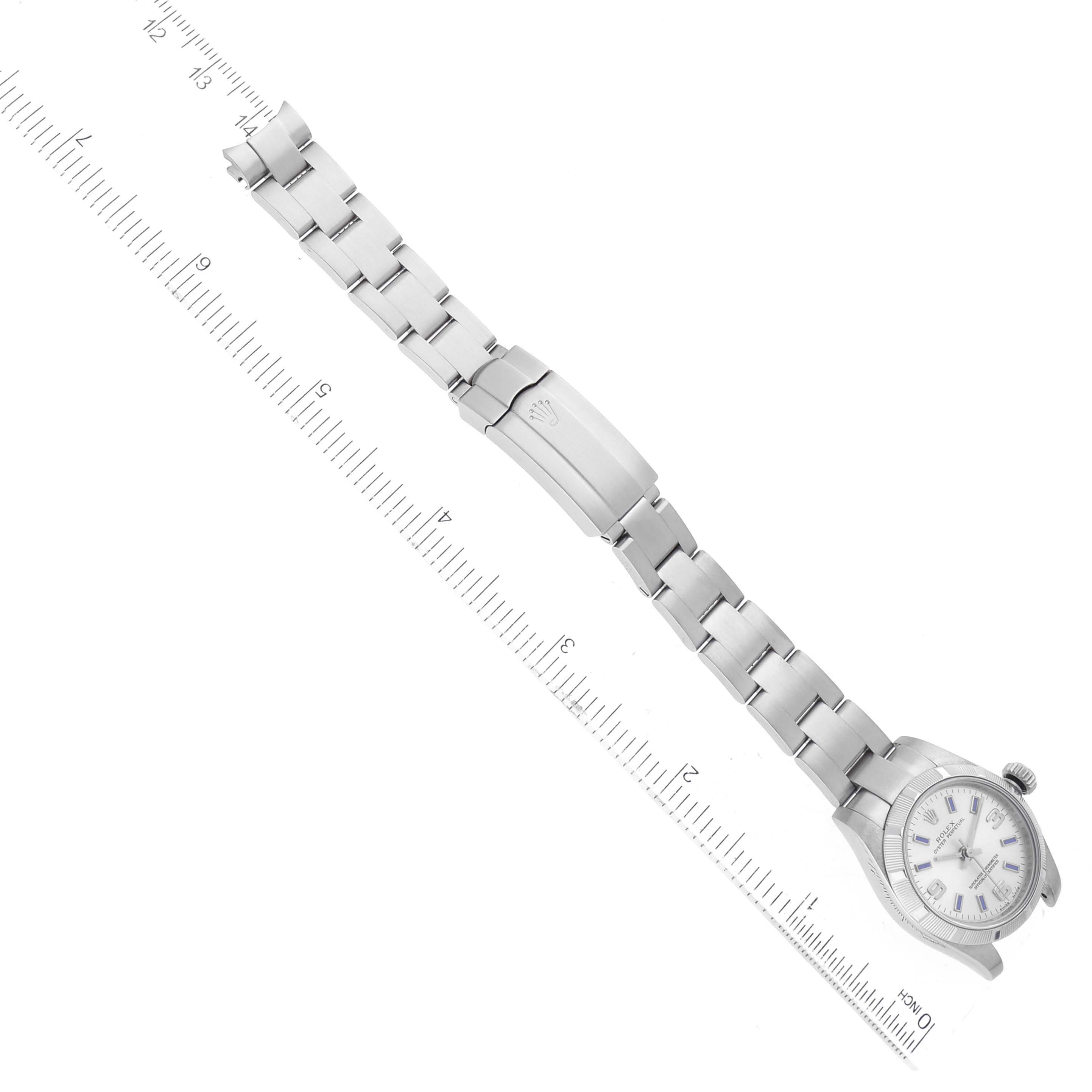 The image shows the entire Rolex Oyster Perpetual 176210 Women's Stainless Steel Silver Dial 176210 Women's Stainless Steel Silver Dial watch laid flat, including its bracelet and clasp, next to a ruler for scale.