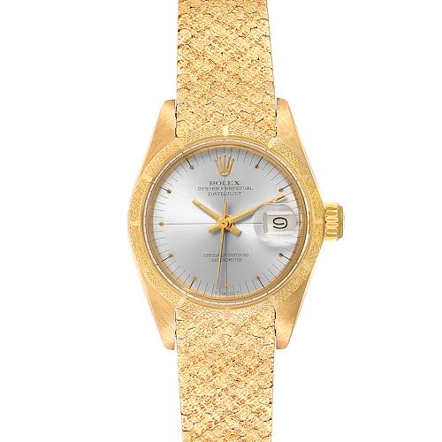 This Rolex President 6900 Women's Yellow Gold Silver Dial 6900 Women's Yellow Gold Silver Dial model is shown from a top-down angle, displaying the dial, bezel, case, and textured band.