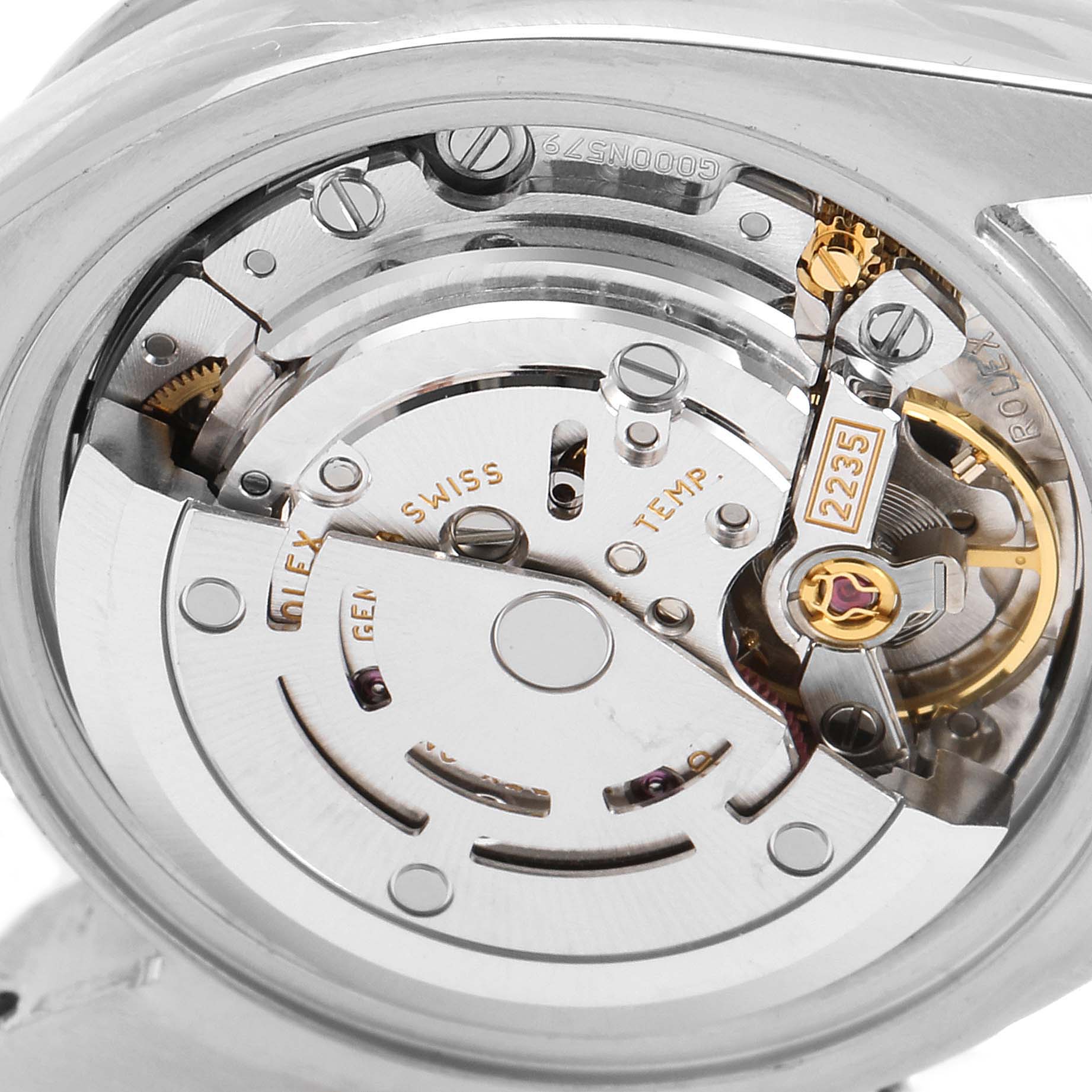 The image shows the internal mechanical movement of a Rolex Datejust 179384 Women's Stainless Steel Pink Dial 179384 Women's Stainless Steel Pink Dial, including gears and the balance wheel, viewed from the back.