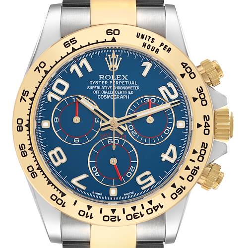 The Rolex Daytona 116503 Men's Steel and Gold (two tone) Blue Dial 116503 Men's Steel and Gold (two tone) Blue Dial watch is shown from a front angle, highlighting its dial, bezel, and pushers.