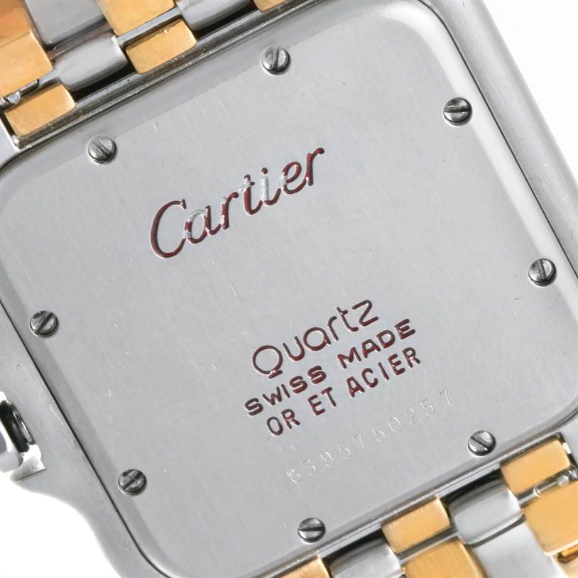 This image shows the back case and part of the bracelet of a Cartier Panthere Steel and Gold (two tone) Silver Dial Steel and Gold (two tone) Silver Dial quartz watch.