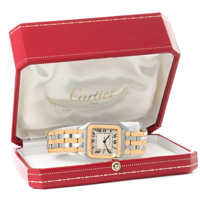 The image shows a Cartier Panthere Steel and Gold (two tone) Silver Dial Steel and Gold (two tone) Silver Dial watch in a red Cartier box, displaying its face and bracelet from a front angle.