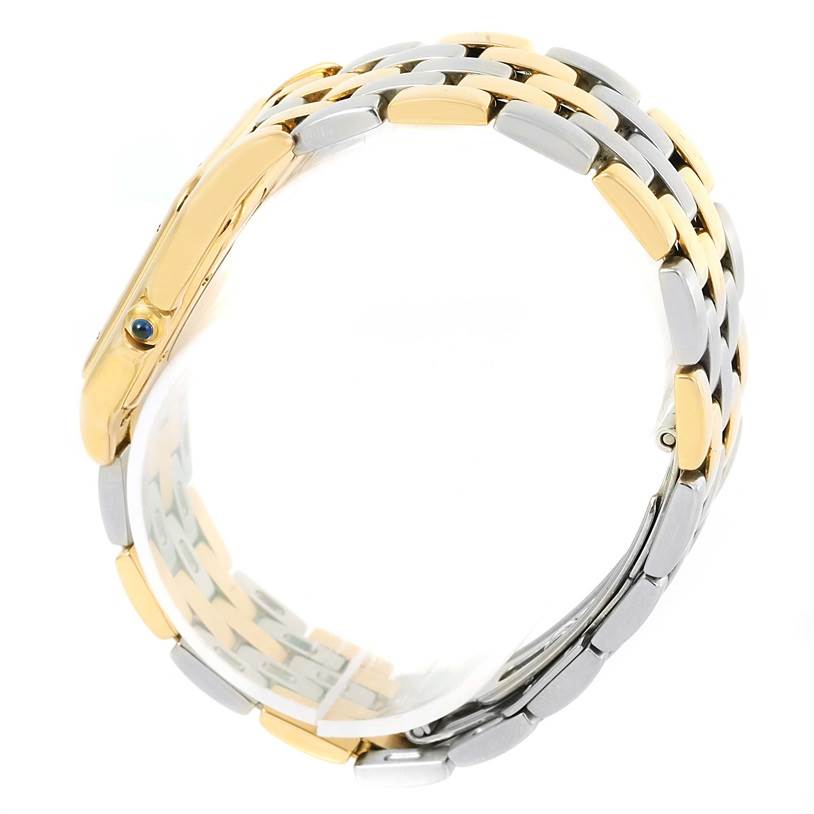 The image shows a side angle of the Panthere model by Cartier, highlighting its two-tone bracelet and crown with a blue cabochon.