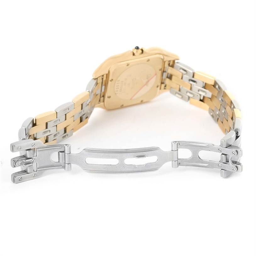 The image shows the backside and clasp of the two-toned bracelet on a Panthere model by Cartier.