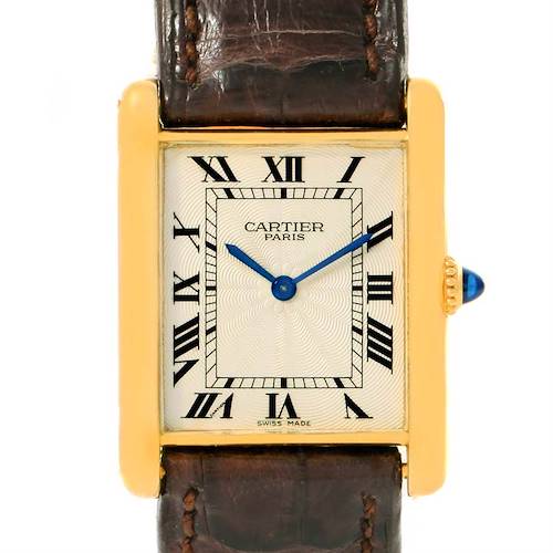 The image shows a frontal view of the Cartier Tank Classic Yellow Gold Silver Dial Yellow Gold Silver Dial watch, highlighting its face, bezel, strap, and crown.