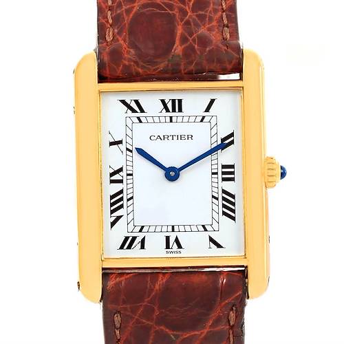 The image shows a front view of the Cartier Tank Classic Yellow Gold White Dial Yellow Gold White Dial watch, highlighting the dial, Roman numerals, and leather strap.
