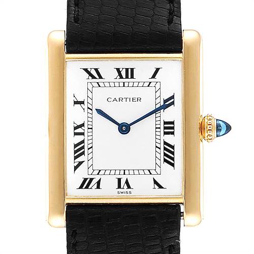 The image shows a Cartier Tank Classic  Men's Yellow Gold White Dial  Men's Yellow Gold White Dial watch from a front angle, highlighting its rectangular face, Roman numerals, and black strap.