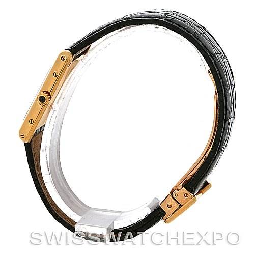 This is a side view of a Cartier Tank Classic Yellow Gold White Dial Yellow Gold White Dial watch showing the black strap and gold case from SwissWatchExpo.