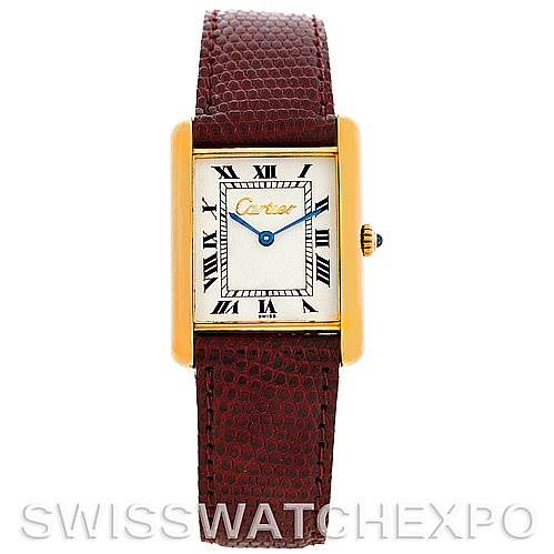 This image shows a frontal view of a Cartier Tank Classic Men's Yellow Gold Silver Dial Men's Yellow Gold Silver Dial watch with a brown leather strap and gold rectangular case.
