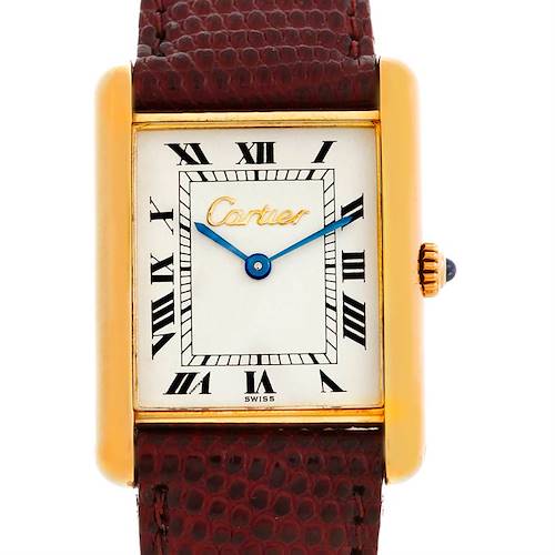 The image shows a front view of the Cartier Tank Classic Men's Yellow Gold Silver Dial Men's Yellow Gold Silver Dial model watch, including its face and part of the leather strap.