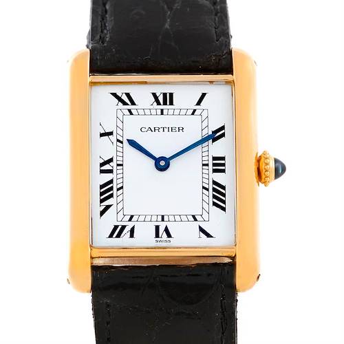 This image shows a front view of the Tank Classic model by Cartier, highlighting its rectangular dial, blue hands, and leather strap.