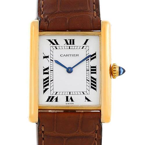 This image shows a front view of a Tank Classic watch by Cartier, highlighting its dial, Roman numerals, and leather strap.